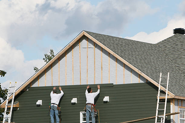 Professional Storm Damage Siding Repair technician working in Hallieford, VA